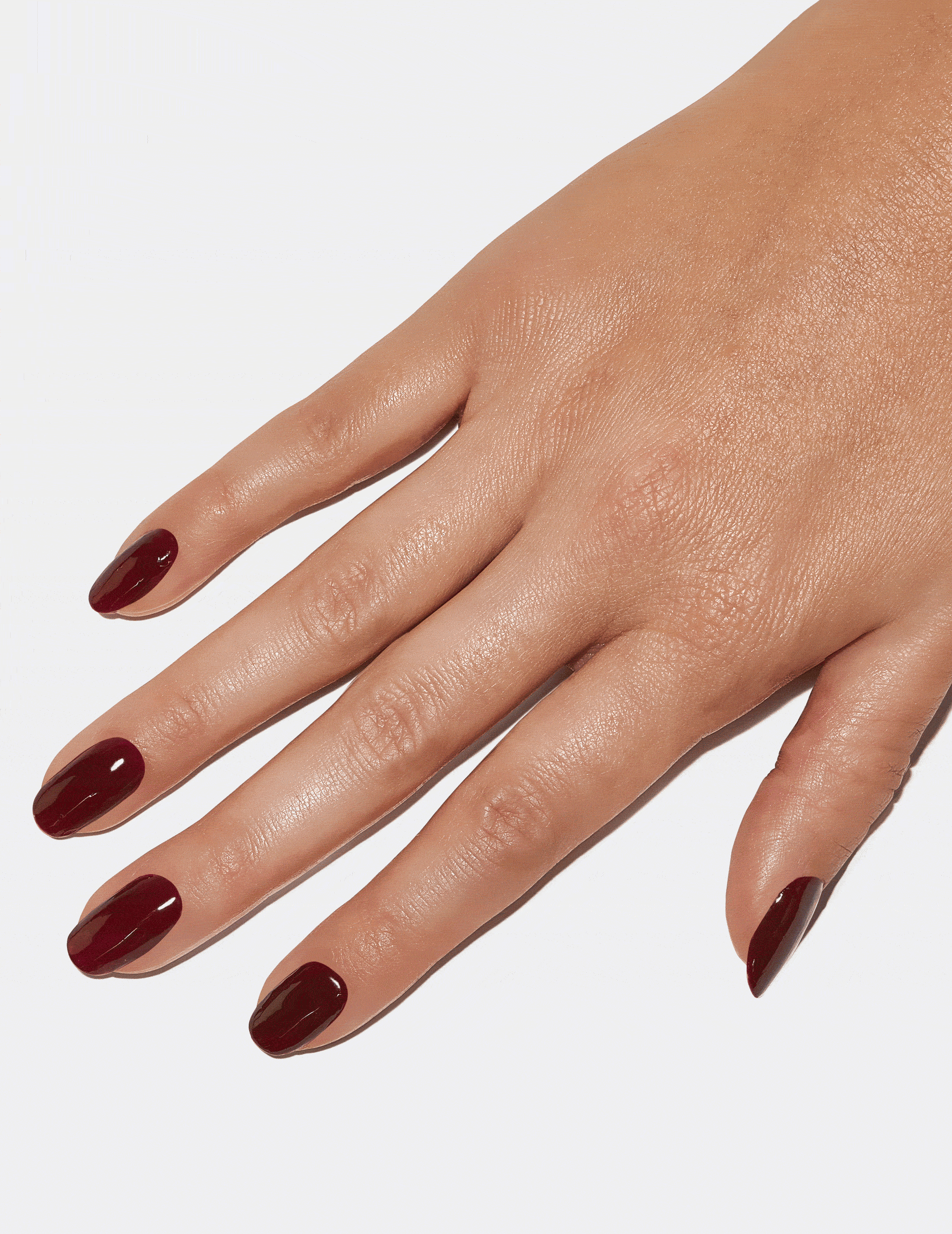Hand with Cassis Gel Polish